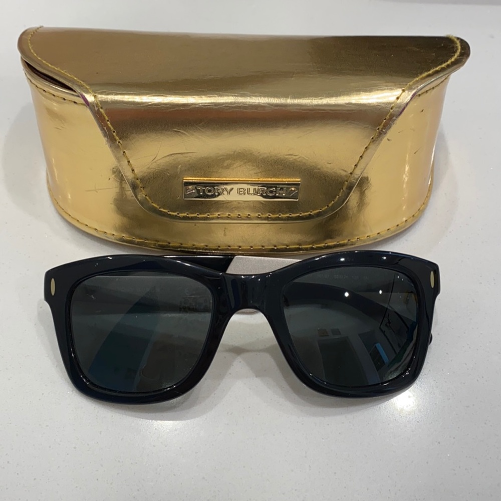 Tory Burch sunglasses.